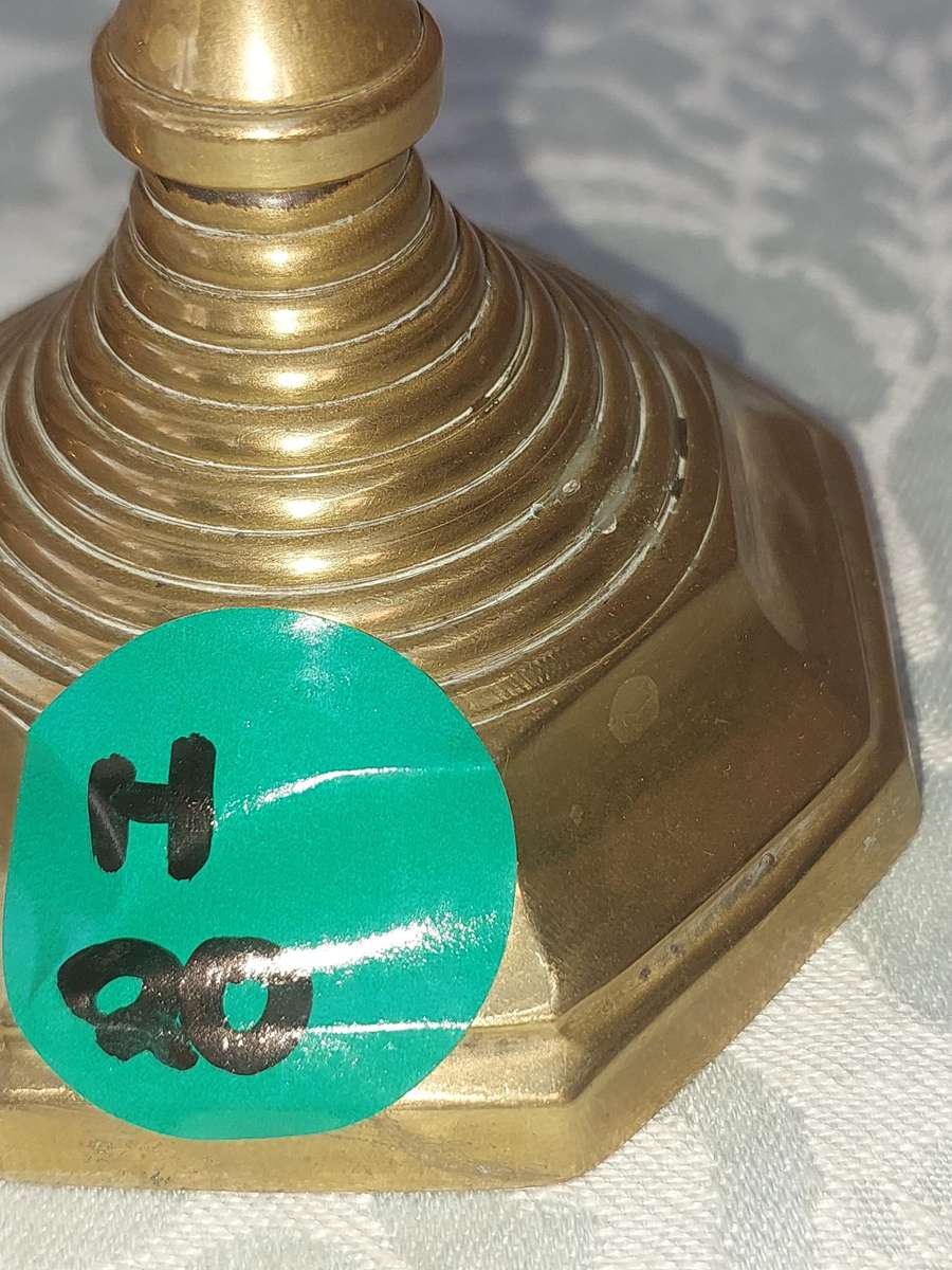 A VINTAGE PAIR OF VICTORIAN BRASS CANDLE HOLDER SOLD AS IS