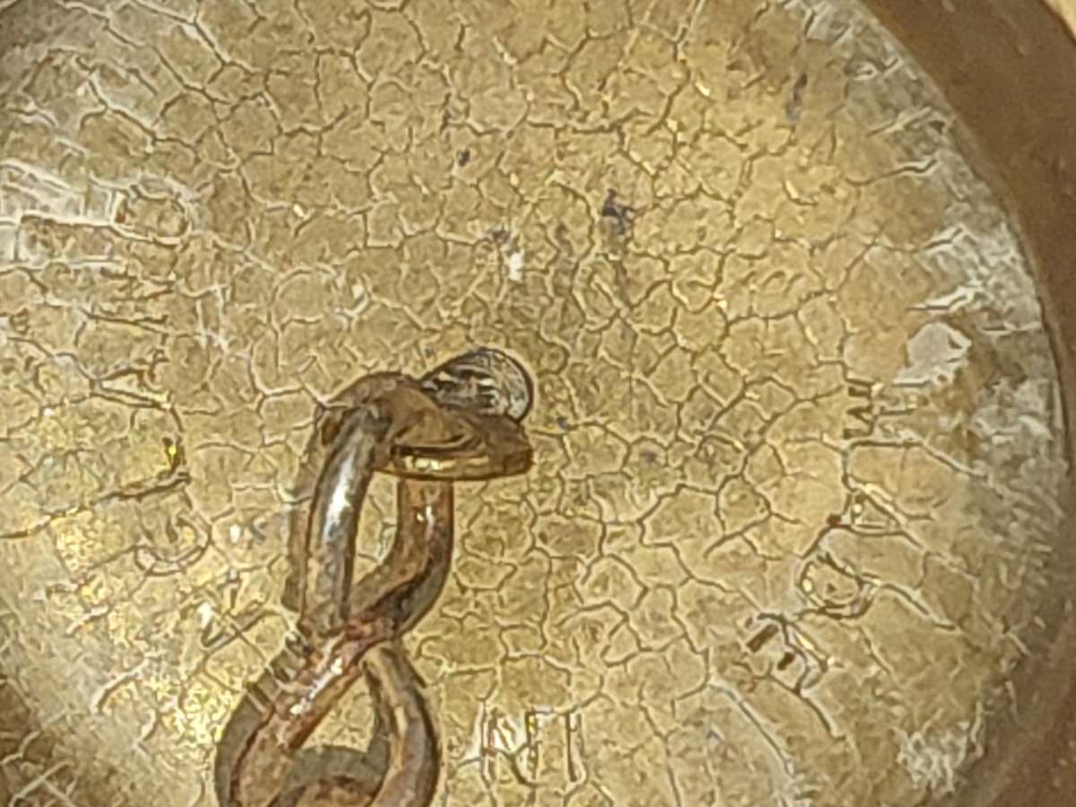 A VINTAGE BRASS VASE AND A BELL SOLD AS IS