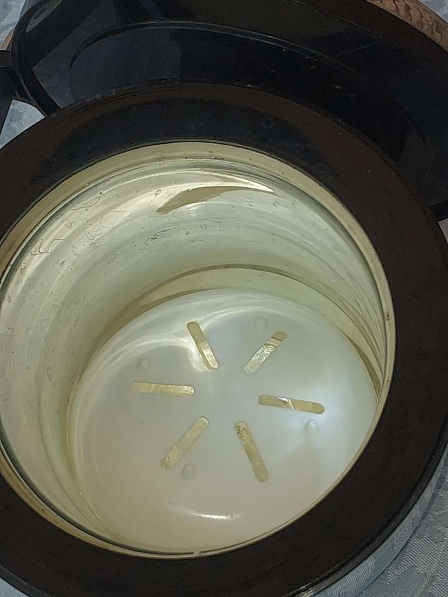 AN ART DECOR STAINLESS STEEL ICE BUCKET SOLD AS IS