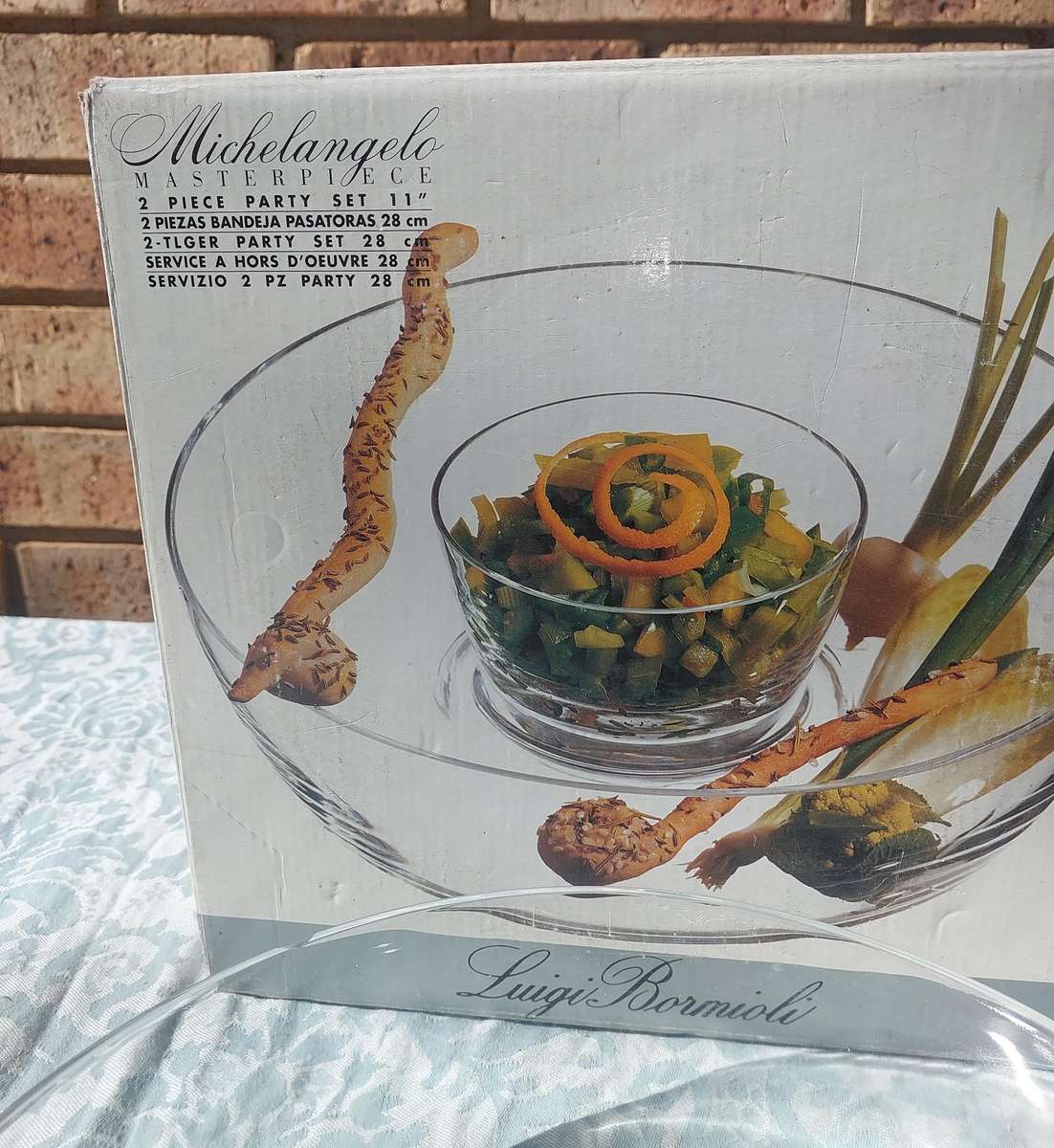 A GLASS PARTY BOWL WITHOUT THE SMALLER BOWL