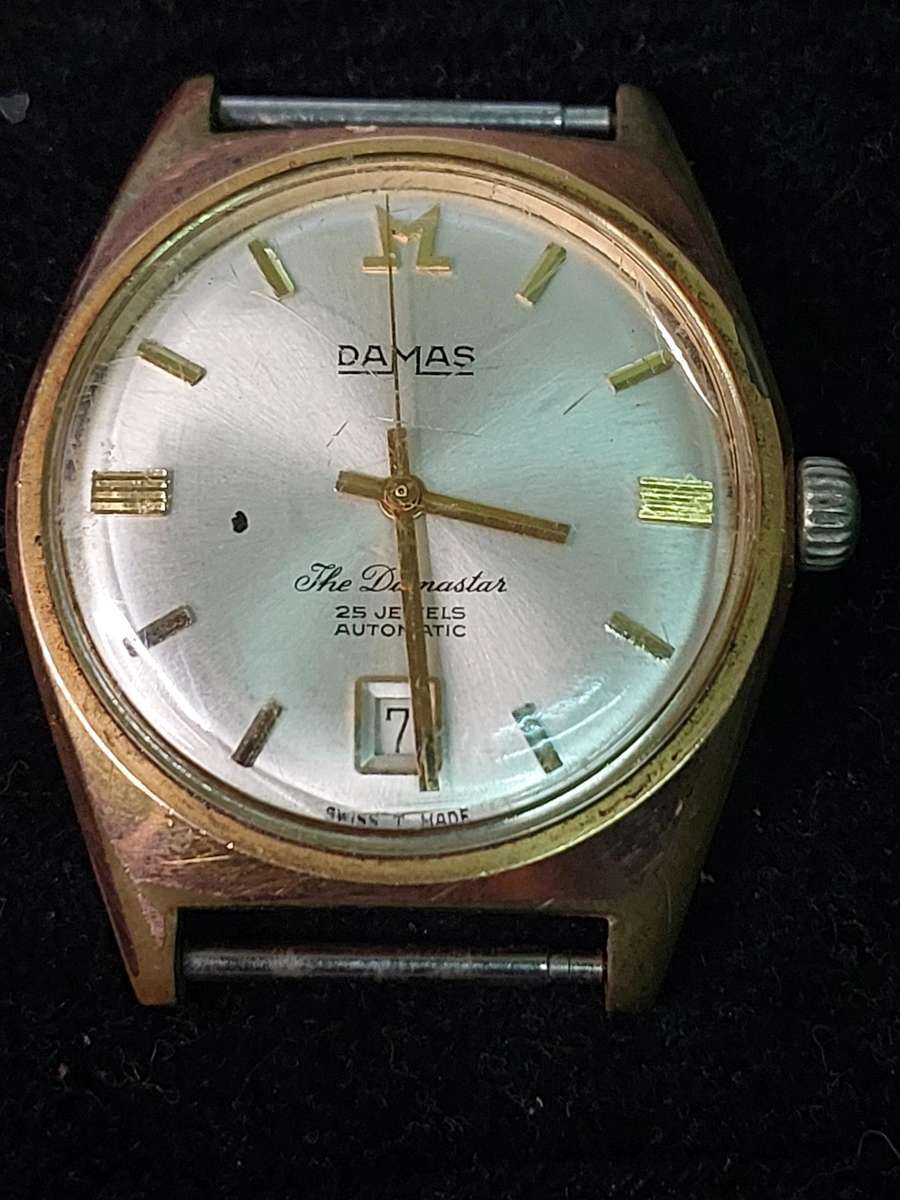 A VINTAGE RARE DAMAS AUTOMATIC 25 JEWELS SWISS CALENDAR MENS WATCH WORKING SOLD AS IS