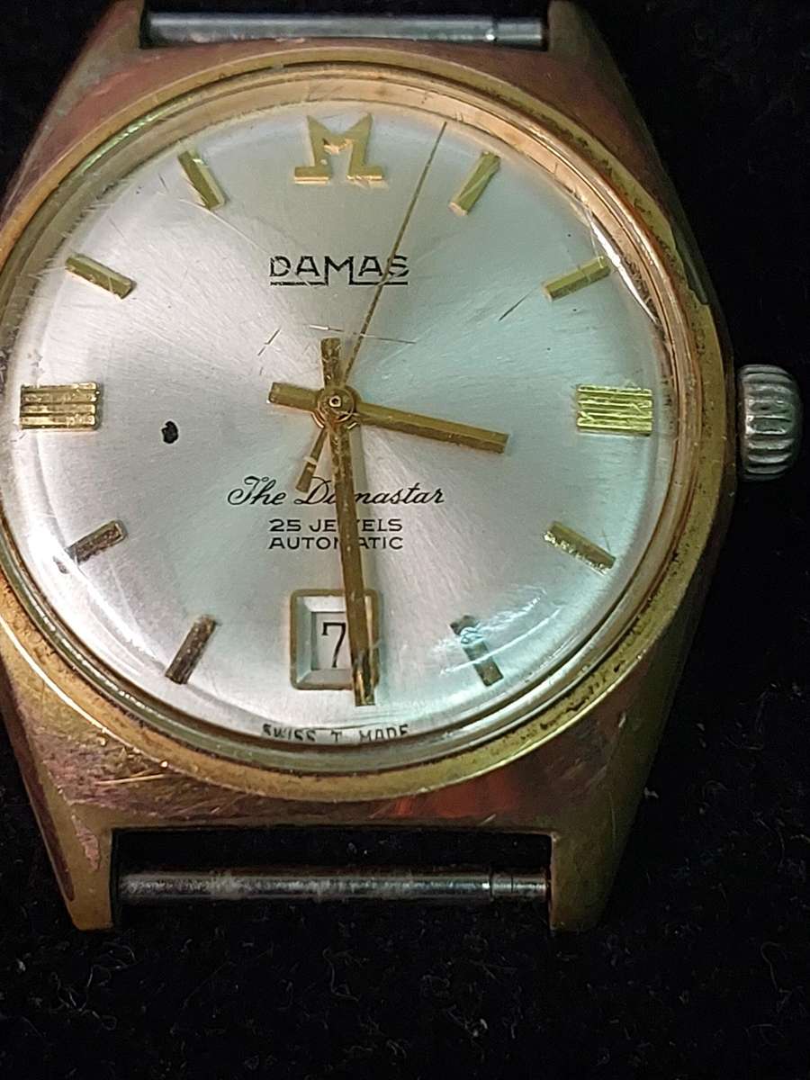 A VINTAGE RARE DAMAS AUTOMATIC 25 JEWELS SWISS CALENDAR MENS WATCH WORKING SOLD AS IS
