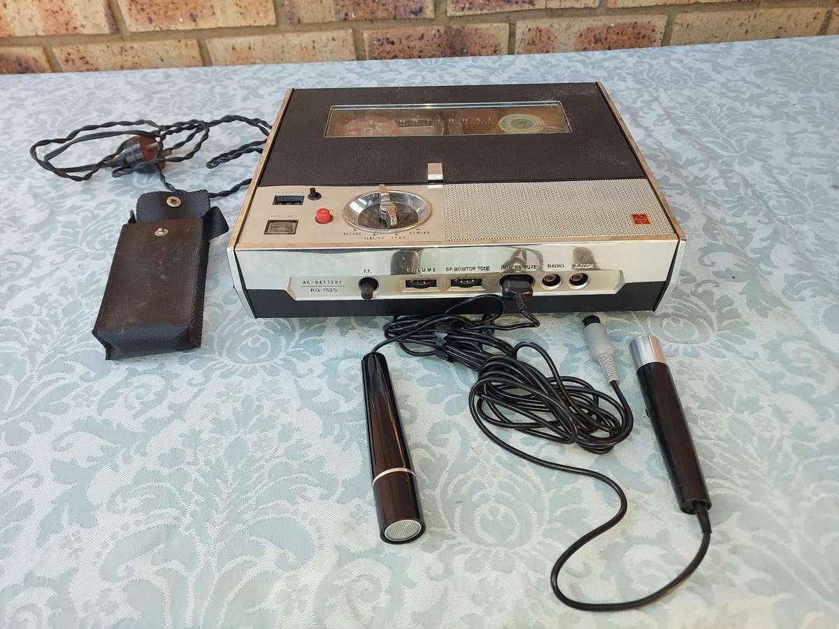 A VINTAGE NATIONAL TAPE RECORDER WITH THE MICROPHONES SOLD AS IS NOT TESTED