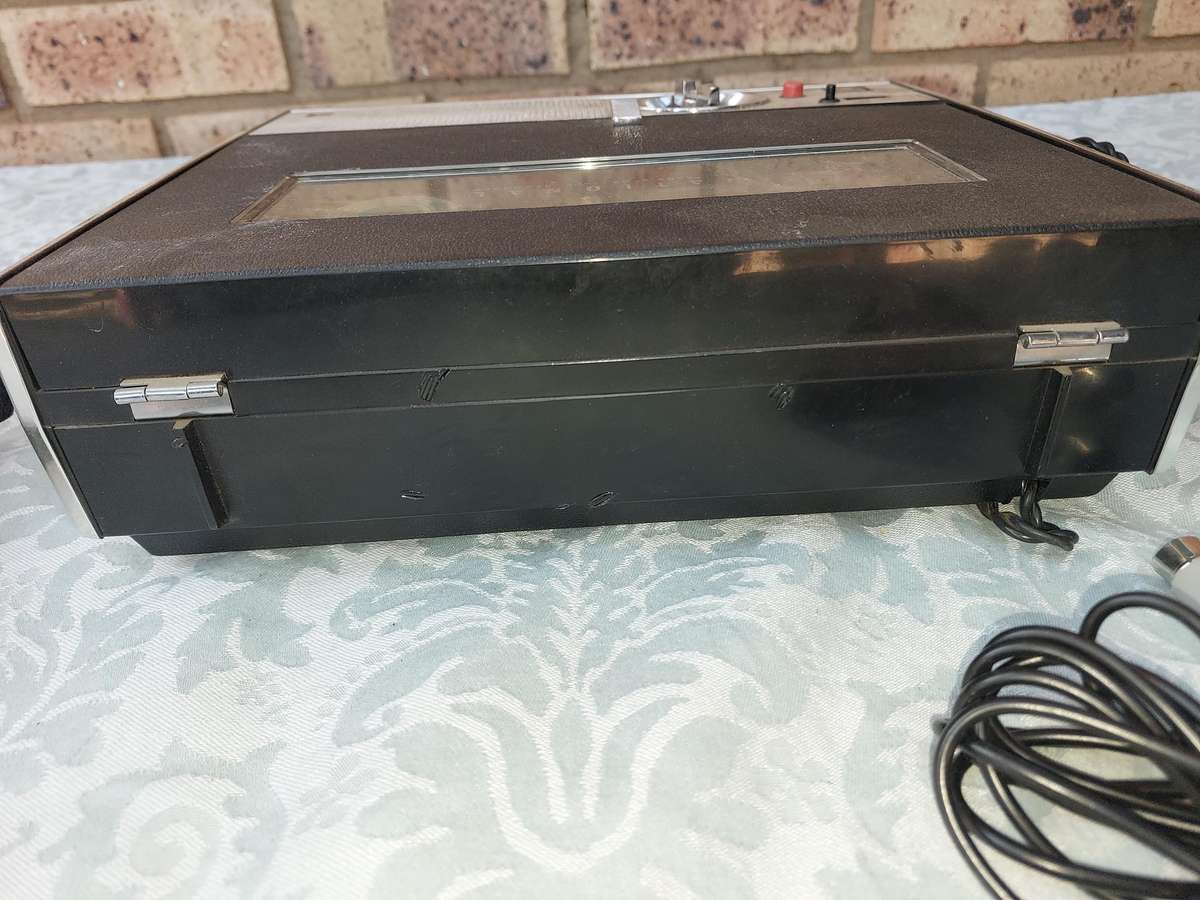 A VINTAGE NATIONAL TAPE RECORDER WITH THE MICROPHONES SOLD AS IS NOT TESTED