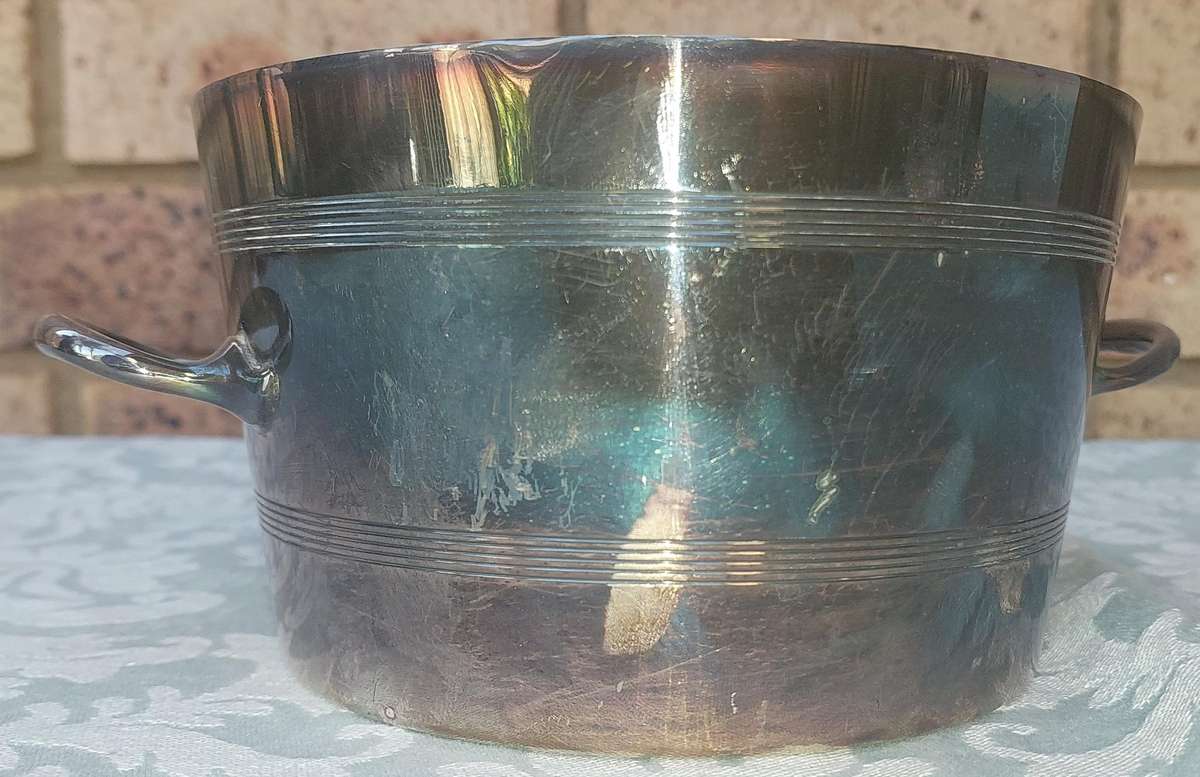 A Mappin and Webb Silver Plated Two-Piece Ice Pail  sold as is