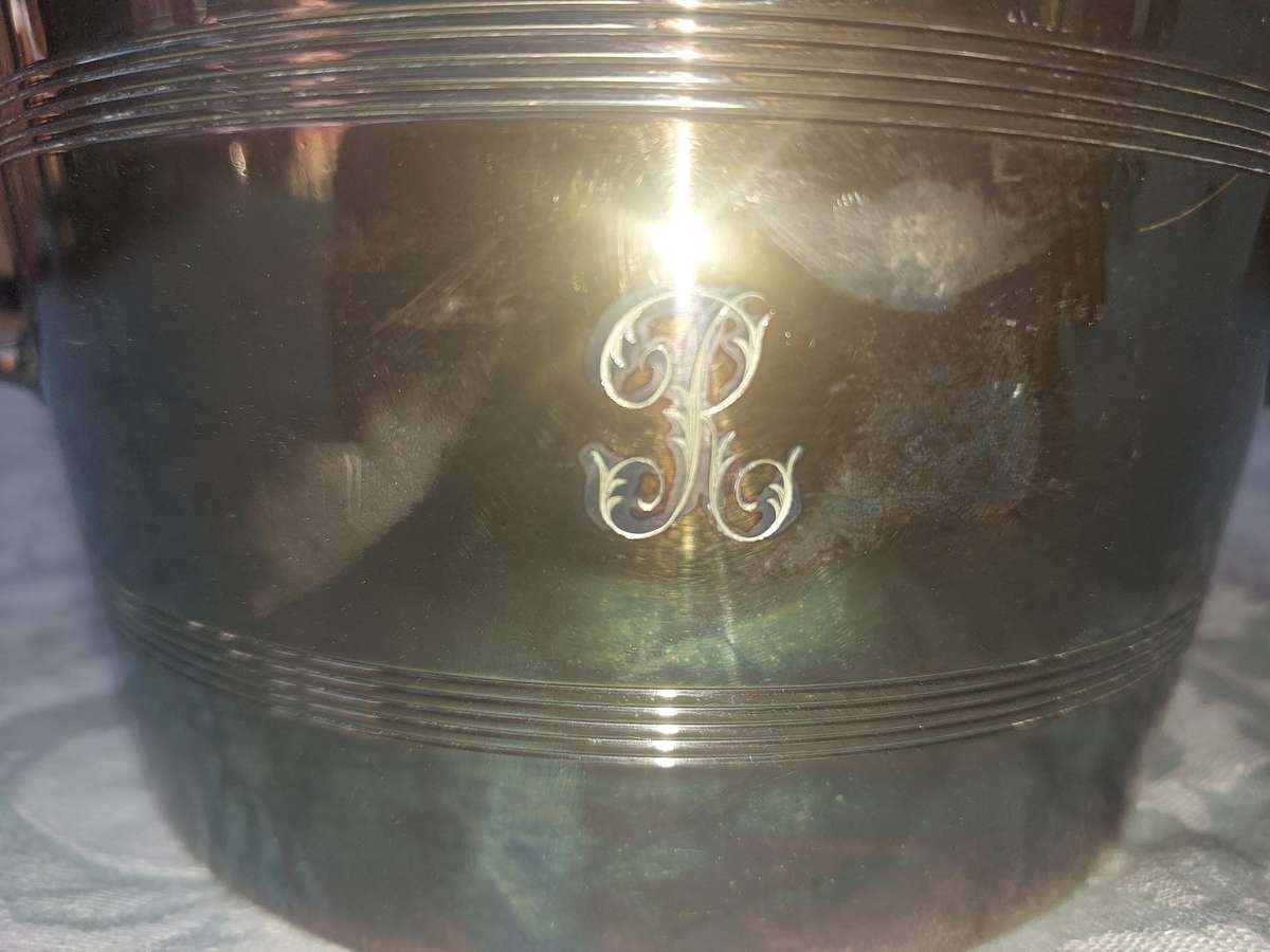 A Mappin and Webb Silver Plated Two-Piece Ice Pail  sold as is