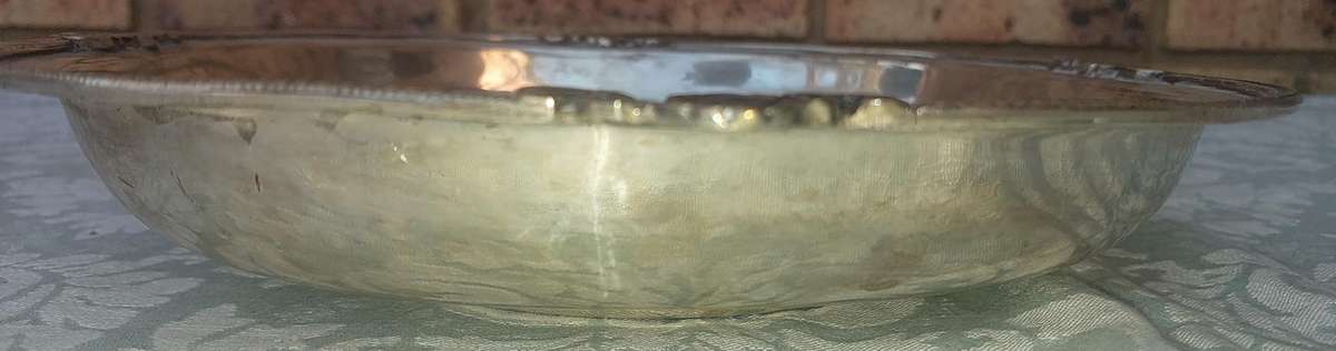 A VINTAGE VICTORIAN SILVER PLATED SERVING BOWL SOLD AS IS