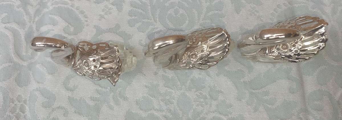 A set of 3 Swan Salt Cellars with out  Spoons Silver Plate vintage sold as is