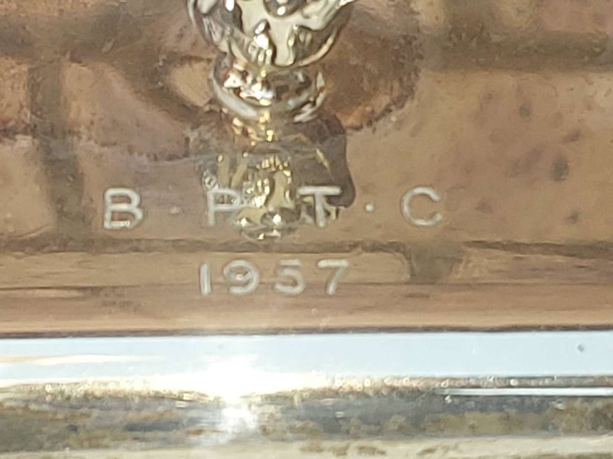 A VINTAGE SILVER PLATED BUTTER DISH SOLD AS IS