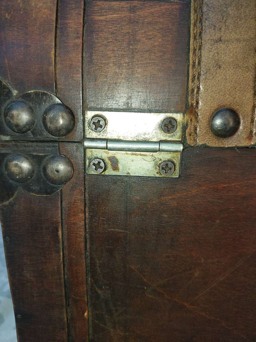 AN ART DECOR WOODEN PIRATES CHEST SOLD AS IS