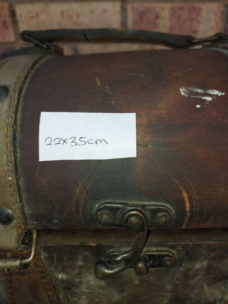 AN ART DECOR WOODEN PIRATES CHEST SOLD AS IS