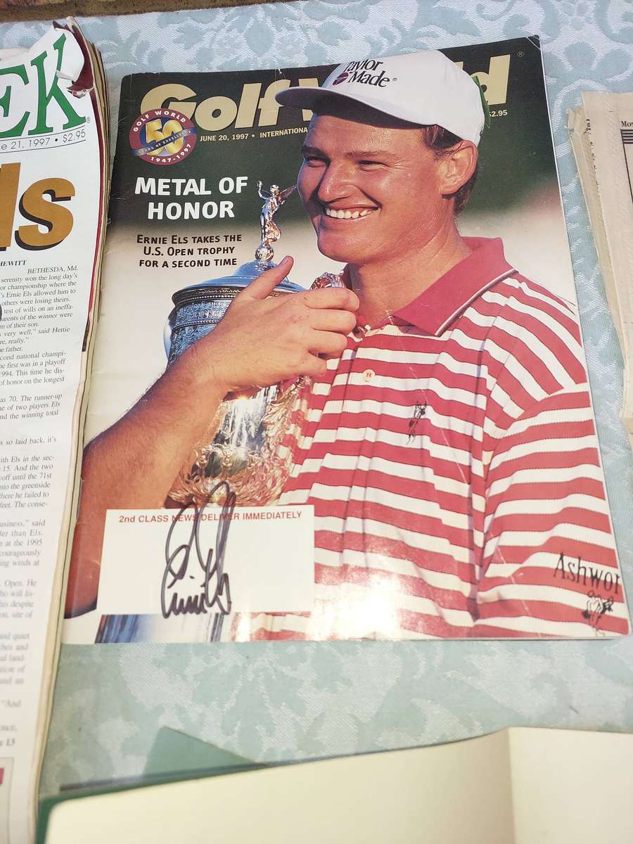 AN ENTIRE COLLECTION ERNIE ELS GOLFING LEGEND MEMORABILIA SOLD AS IS
