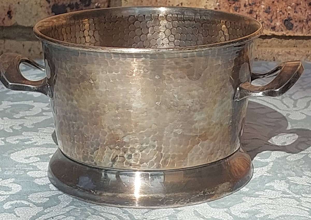 A VINTAGE ICE BUCKET SOLD AS IS