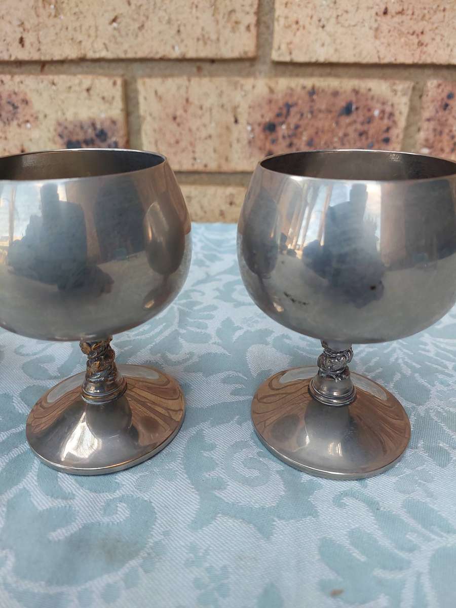 A SET OF 4 TIVOLI MADE IN SPAIN GOBLETS WITH TWISTED STEMS