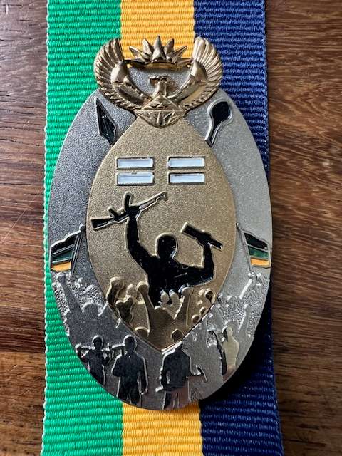 All Three MK Veterans Decoration in Platinum in Classes one, two, and three.