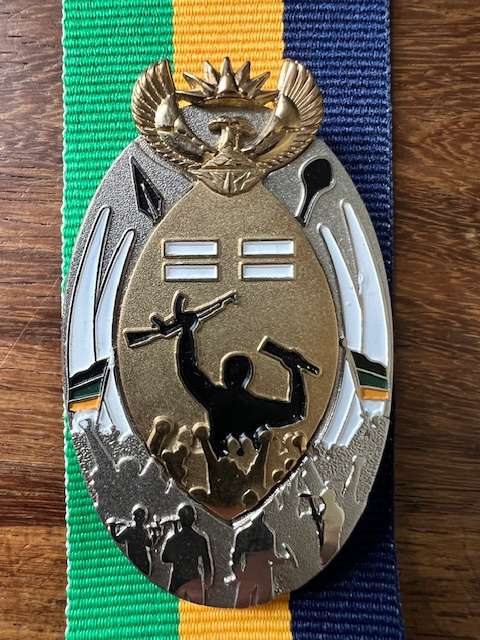 All Three MK Veterans Decoration in Platinum in Classes one, two, and three.