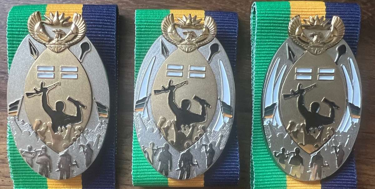 All Three MK Veterans Decoration in Platinum in Classes one, two, and three.