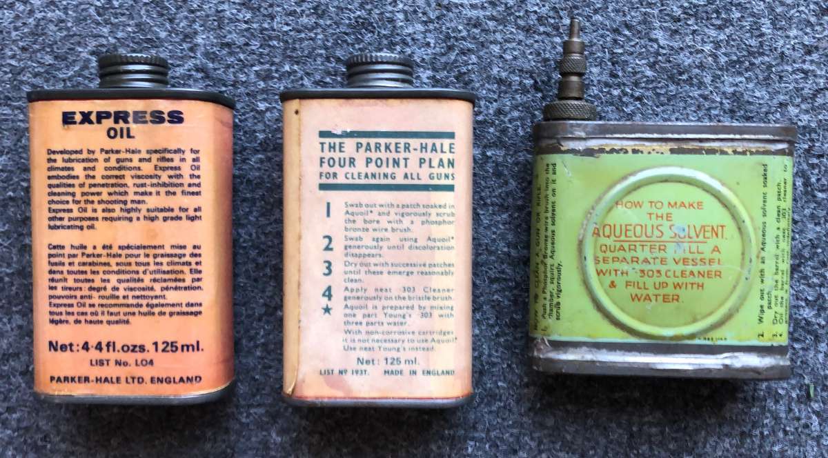 Vintage gun oil tins