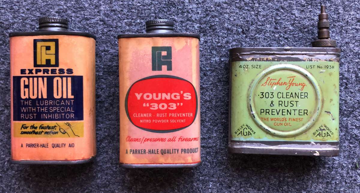 Vintage gun oil tins
