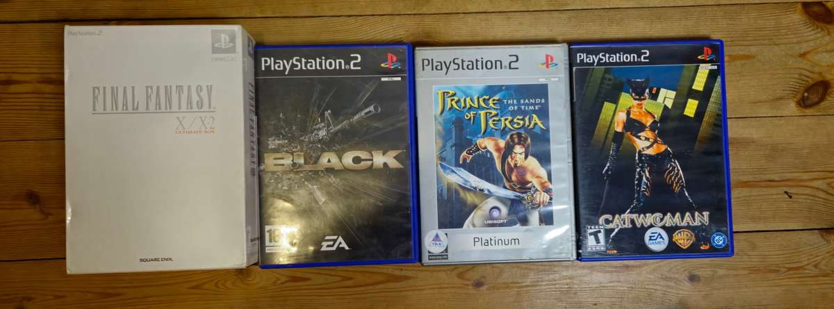 PlayStation 2 Console Bundle  Includes 4 Games, Memory Card & AV Cable