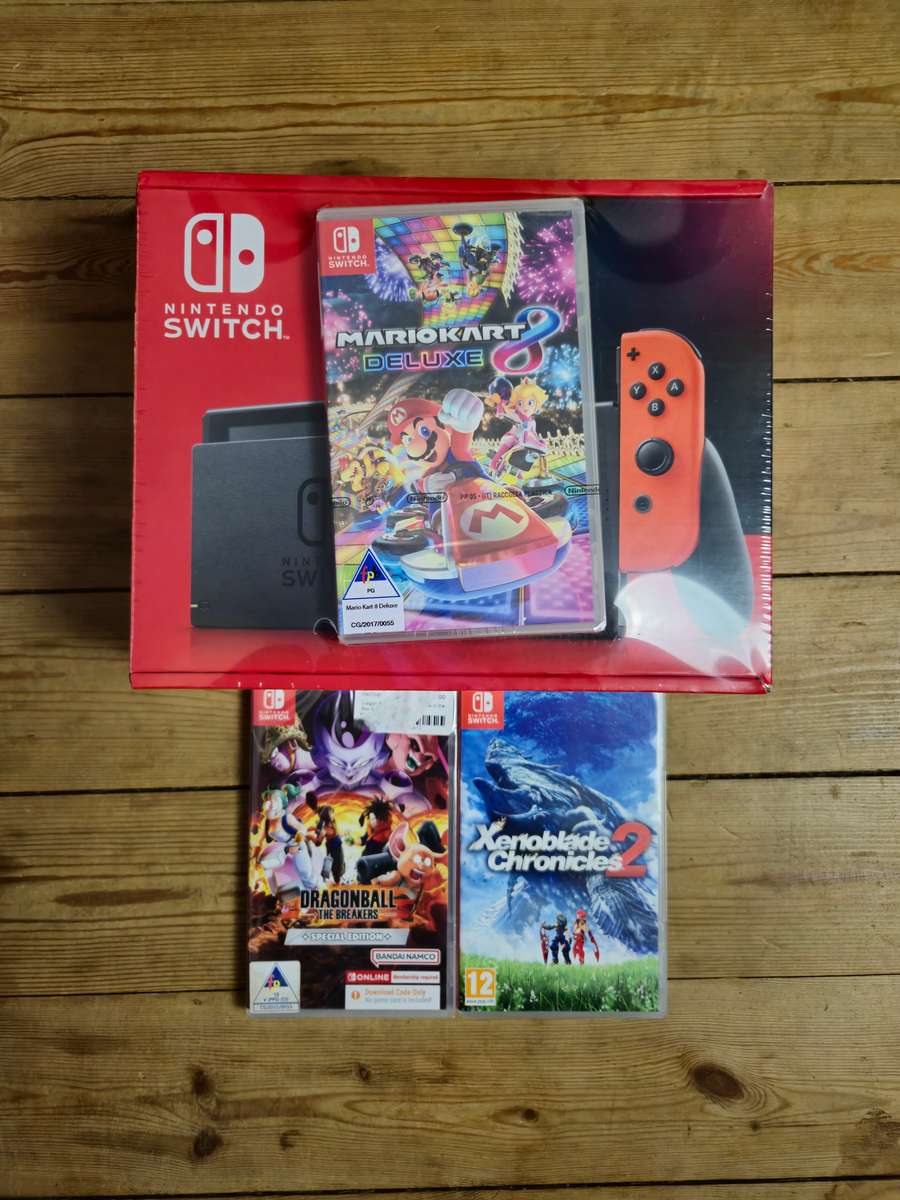 Nintendo Switch Neon Red/Blue Bundle (Boxed & Brand New)