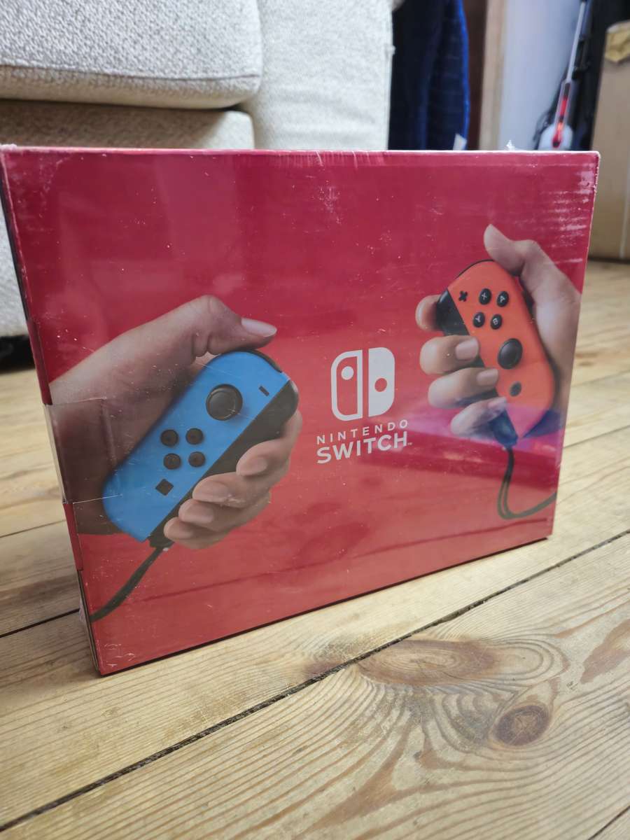Nintendo Switch Neon Red/Blue Bundle (Boxed & Brand New)