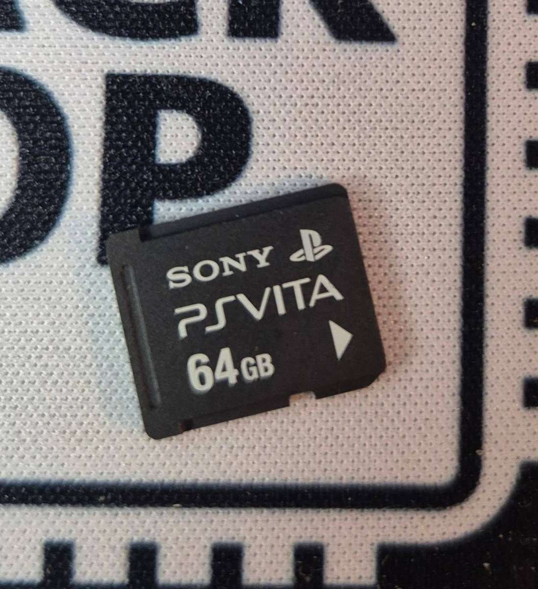 PS Vita OG OLED (Modded) + Rare 64GB Official Sony Card + 3 Games