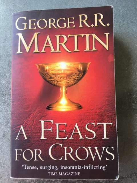 A Feast for Crows (Song of Ice and Fire #4) by George R.R. Martin [Paperback: Average]
