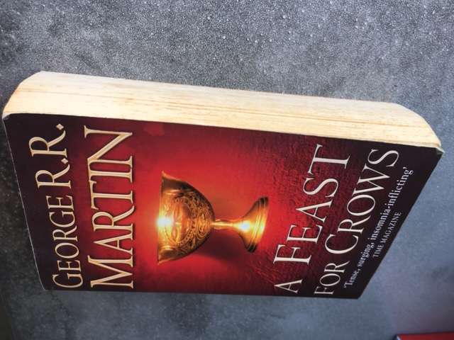 A Feast for Crows (Song of Ice and Fire #4) by George R.R. Martin [Paperback: Average]