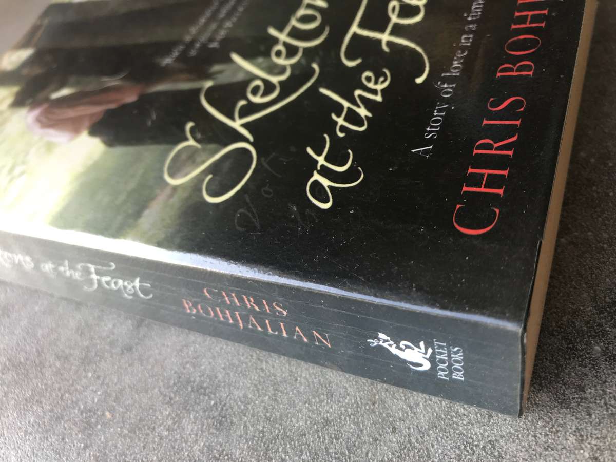 Skeletons at the Feast by Chris Bohjalian [Paperback: Excellent]