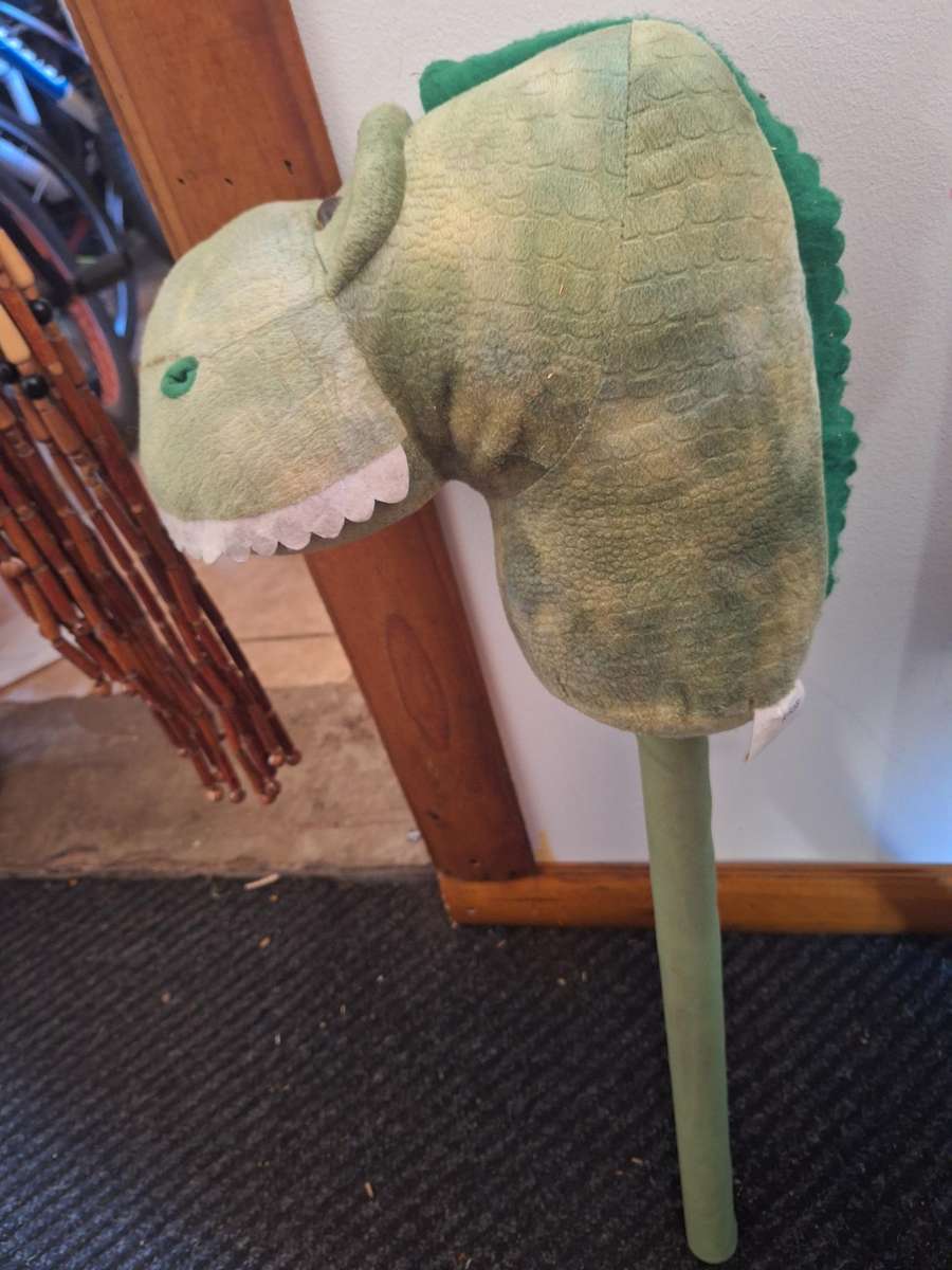 Dinosaur ride-on stick