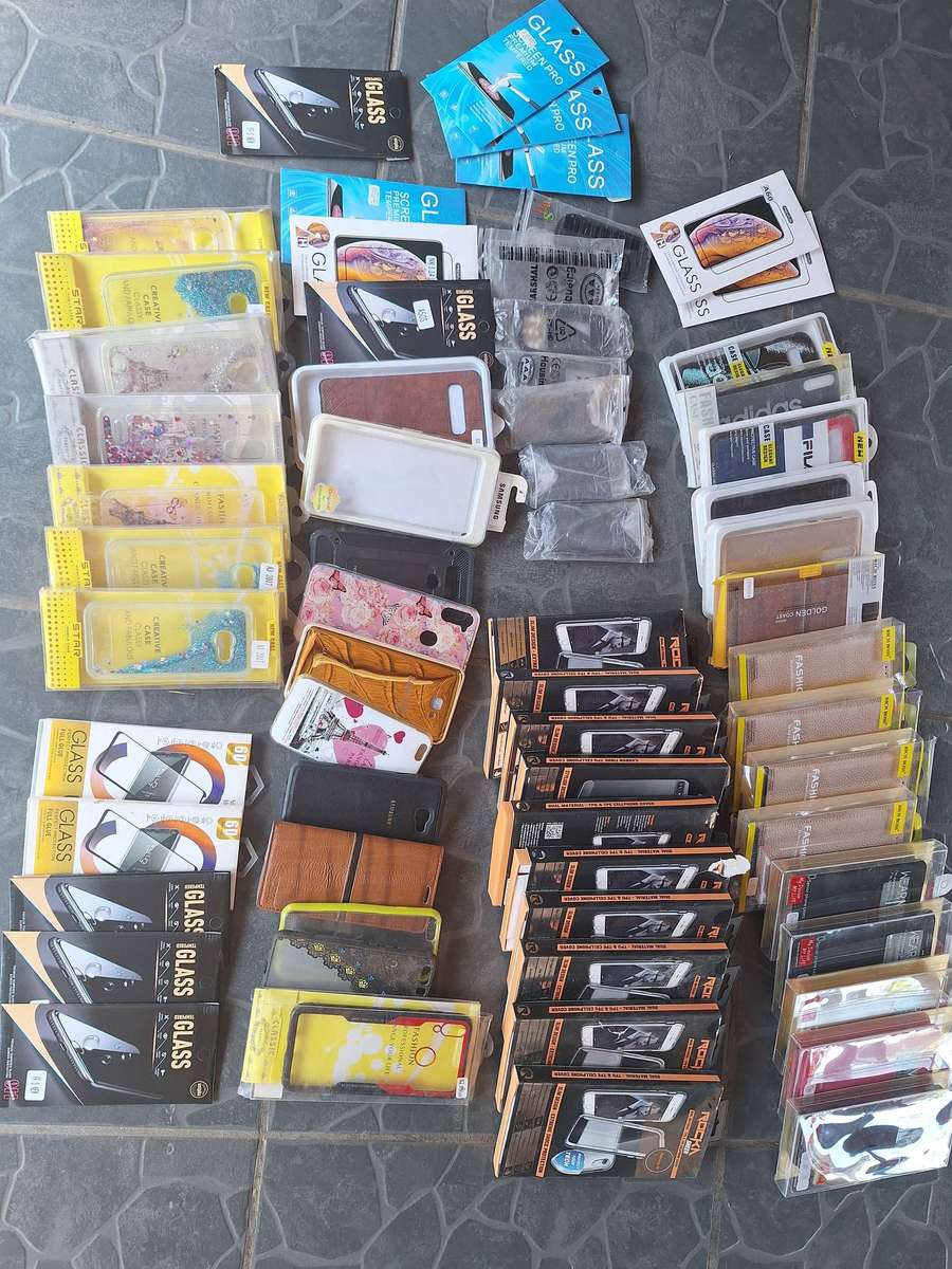 Bulk load of cellphone covers and screne protectors. 64 pieces