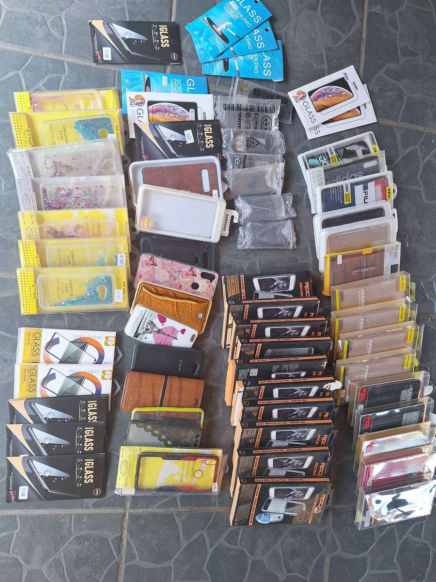 Bulk load of cellphone covers and screne protectors. 64 pieces