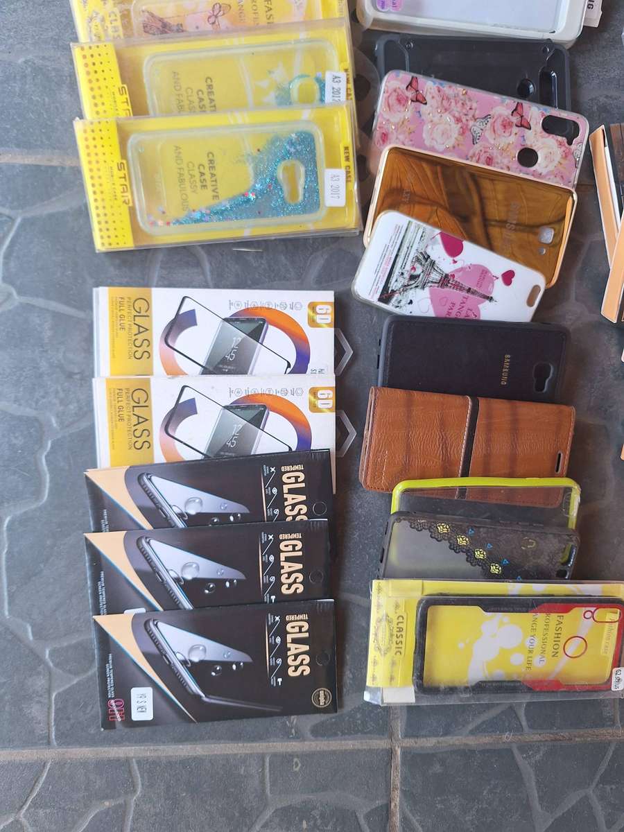 Bulk load of cellphone covers and screne protectors. 64 pieces