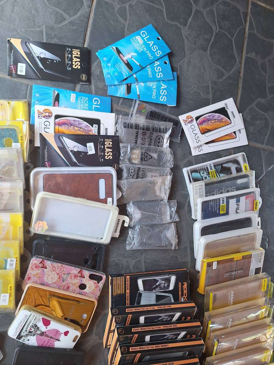 Bulk load of cellphone covers and screne protectors. 64 pieces