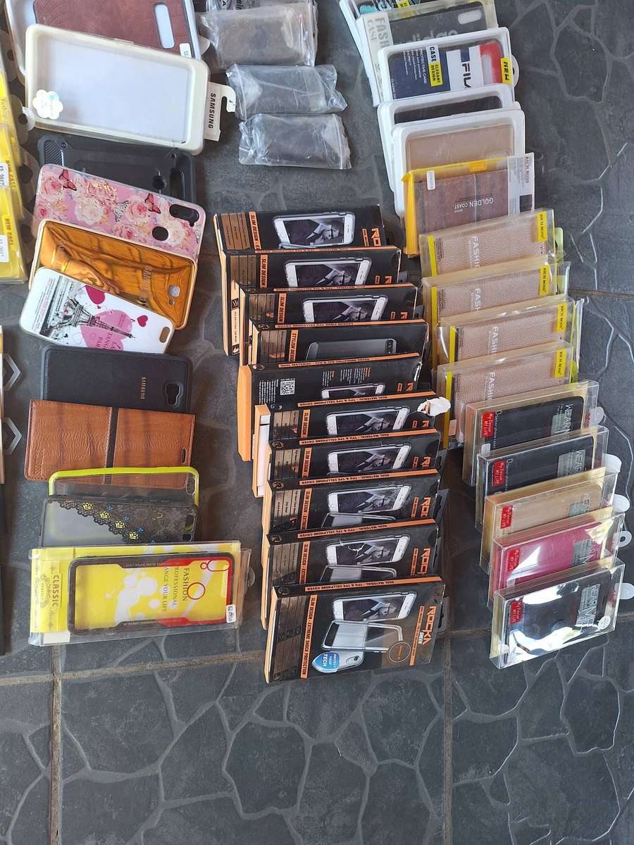 Bulk load of cellphone covers and screne protectors. 64 pieces