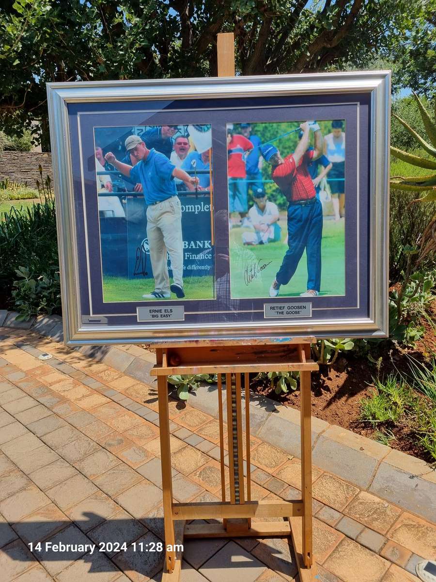 *****ORIGINAL SIGNED AND GLASS FRAMED PHOTO OF SA GOLF LEGENDS - ERNIE ELS AND RETIEF GOOSEN*****