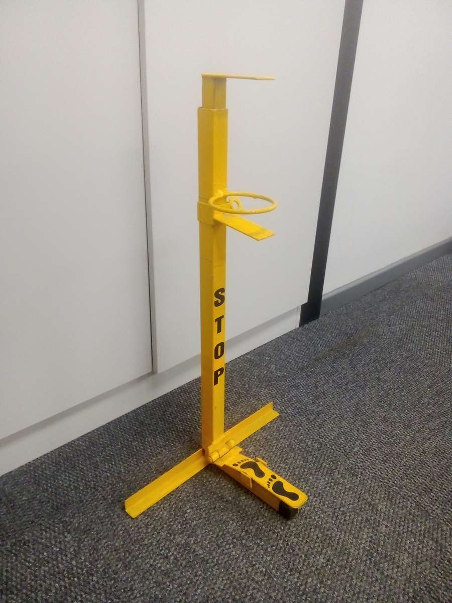 Foot press soap dispenser