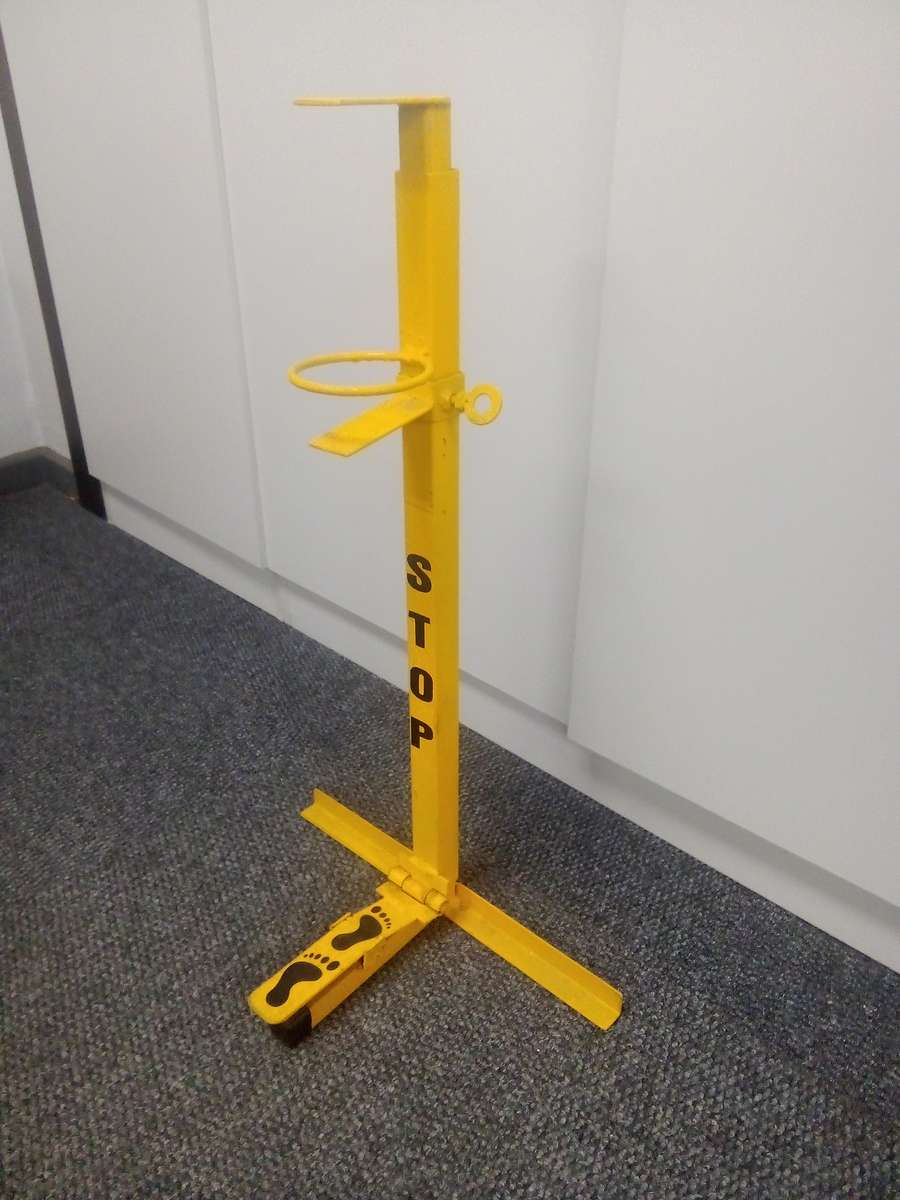 Foot press soap dispenser