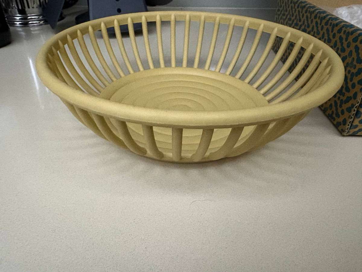 Alessi EM01 O bread basket by Enzo Mari