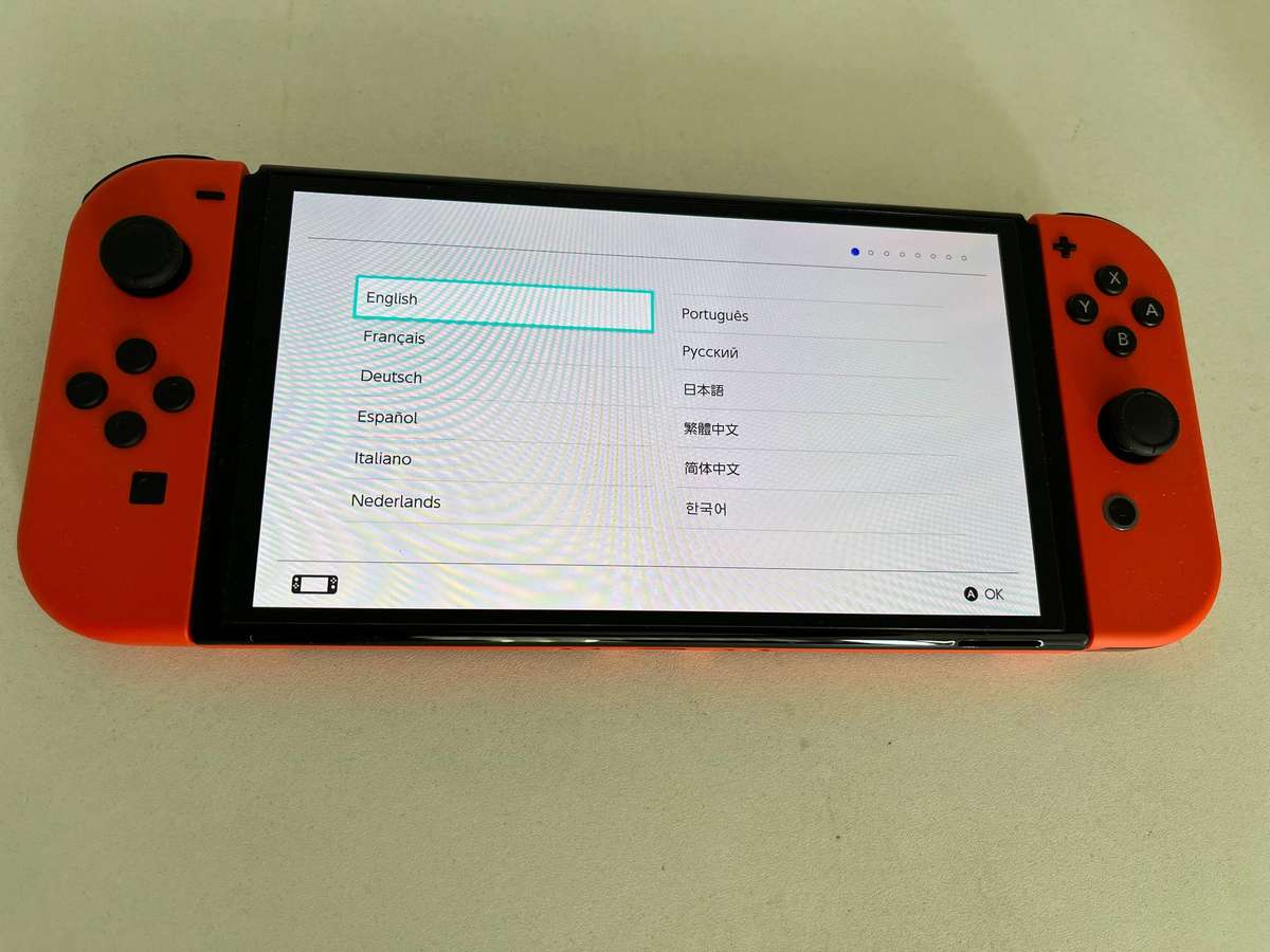 Nintendo Switch - OLED Model: Mario Red Edition + Metal Gear Solid Vol. 1 Master Collection