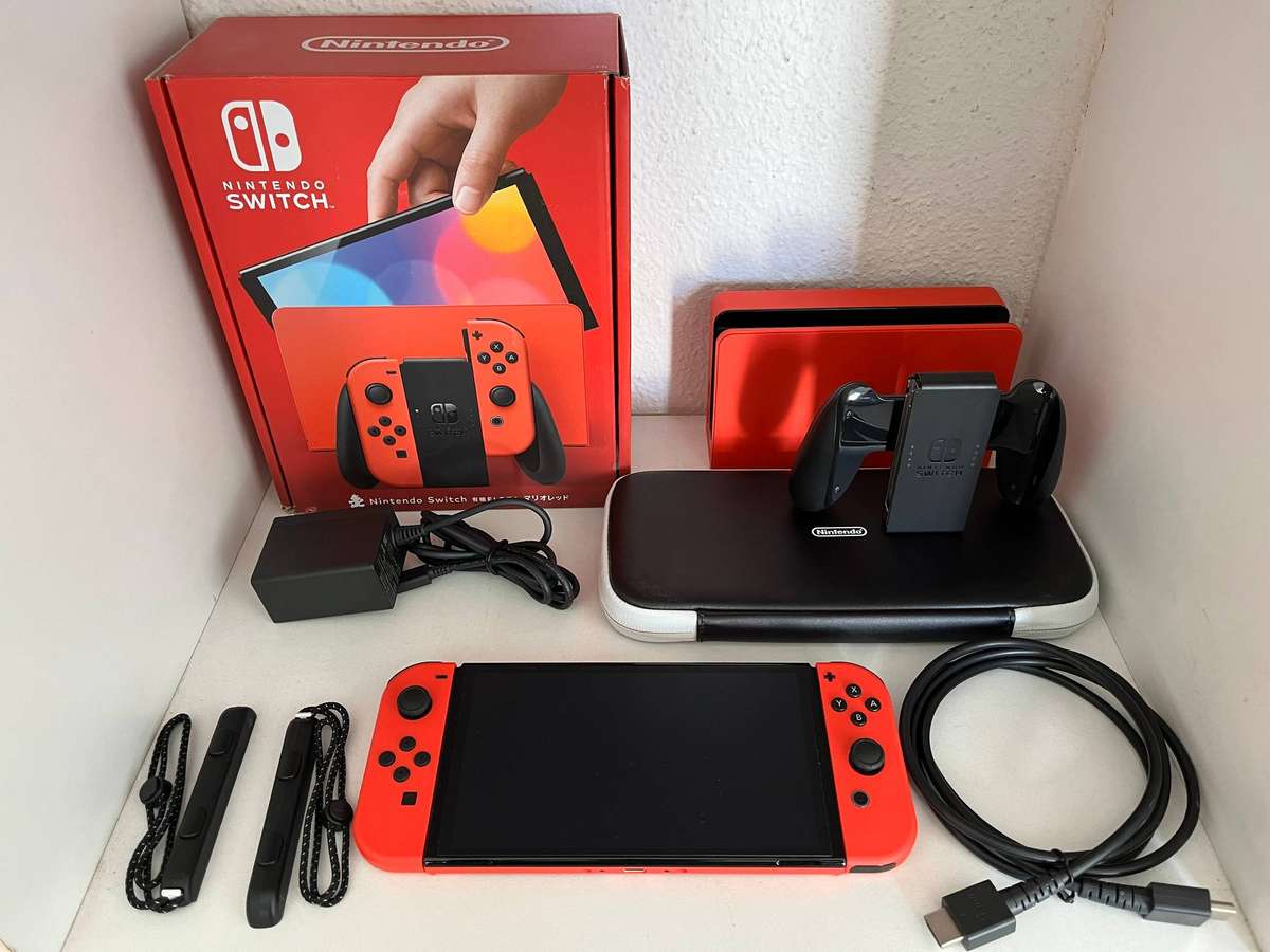 Nintendo Switch - OLED Model: Mario Red Edition + Metal Gear Solid Vol. 1 Master Collection