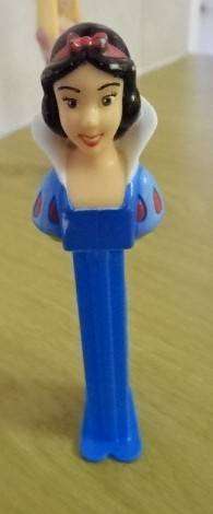 FOUR DISNEY PEZ DISPENSERS: FIREMAN SAM, 2X BARBIE'S  AND SNOWWHITE
