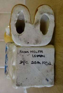 CERAMIC BOY FIGURINE WITH BASKET (DATED 1952) HEIGHT 10CM