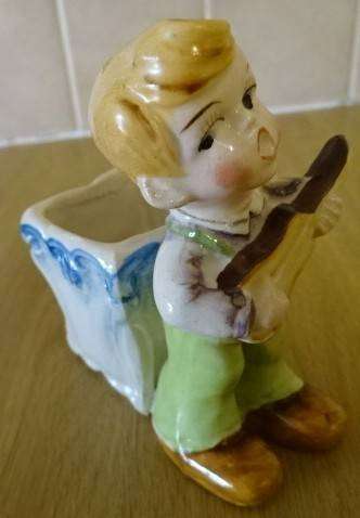 CERAMIC BOY FIGURINE WITH BASKET (DATED 1952) HEIGHT 10CM