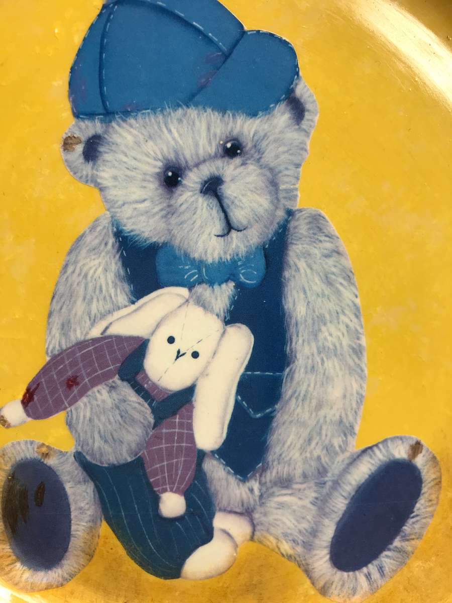 Art Plate Hand Painted Bear holding toy on Yellow signed by artist Sharon 04/03 is 19cm