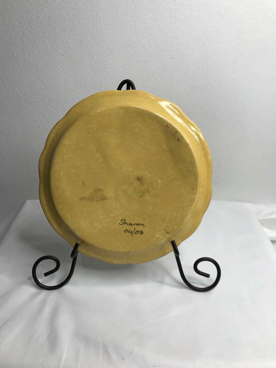 Art Plate Hand Painted Bear holding toy on Yellow signed by artist Sharon 04/03 is 19cm