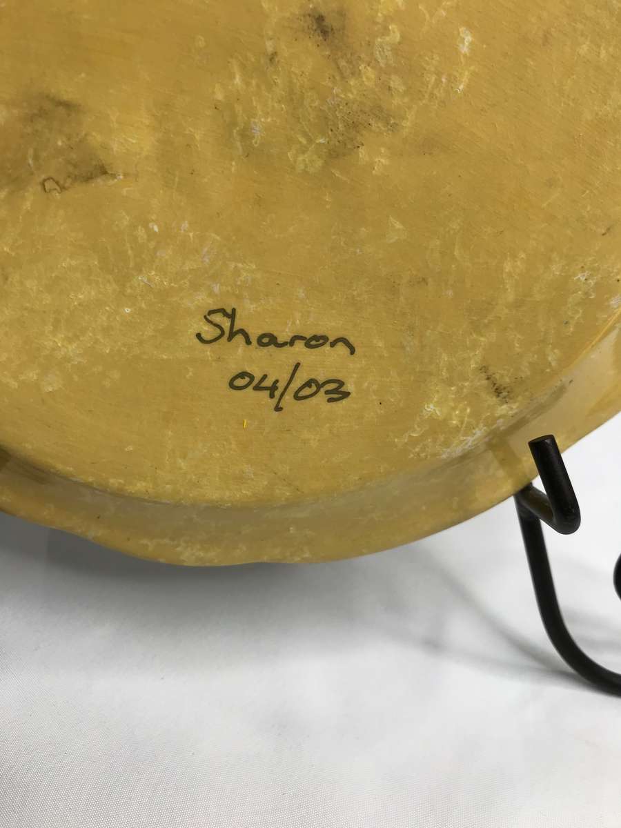 Art Plate Hand Painted Bear holding toy on Yellow signed by artist Sharon 04/03 is 19cm