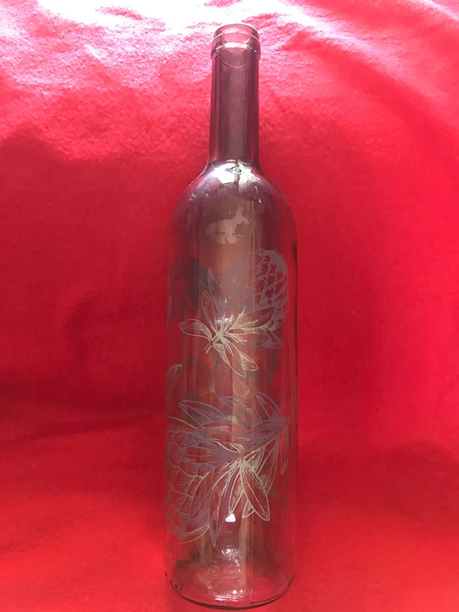 Protea painting on pink bottle