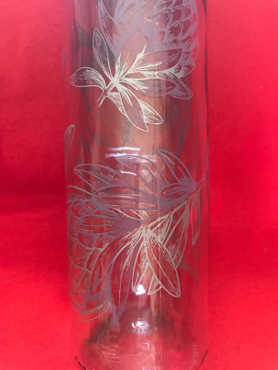 Protea painting on pink bottle
